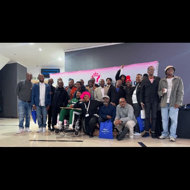 Guests gathered for a group photograph at Men’s Chests United.