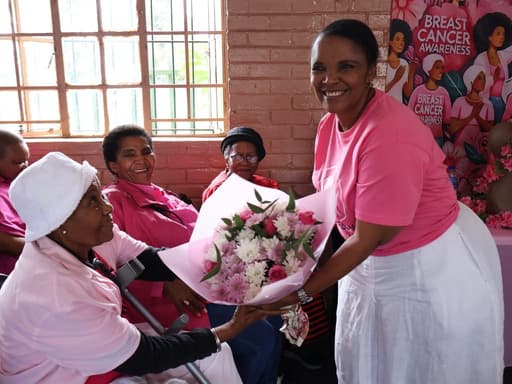 Foundation volunteers sharing practical support with a community member